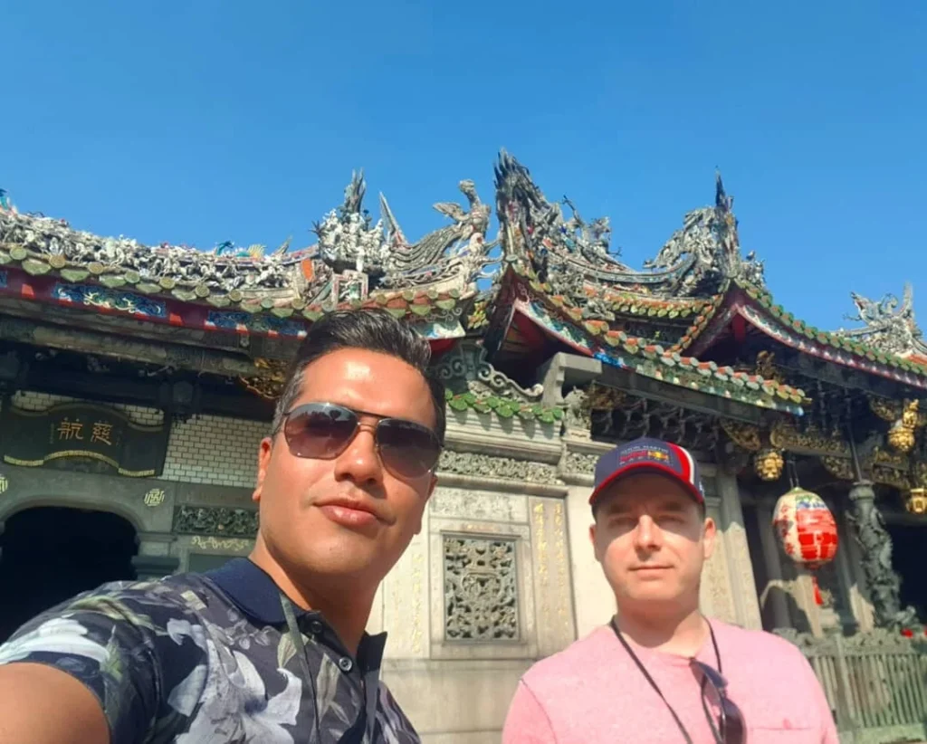 Keelung Taipei Cruise Port: Our Complete Guide + Insider Tips 2026 (Visited Once in 2019 by Danny and Peter) 22 Cruising with Danny and Peter, Holland America Line, Westerdam, Keelung, Taipei, Taiwan | Vibrant scene of Keelung Night Market showcasing diverse Taiwanese street food, including oyster pancakes and stinky tofu, with colorful stalls and lively crowds. Scenic views from Chaojing Park overlooking Keelung Harbor, featuring traditional architecture and lush landscapes. Picturesque images of Keelung Island attractions, highlighting pristine beaches and charming fishing villages, capturing the cultural heritage of Keelung and its rich maritime history.