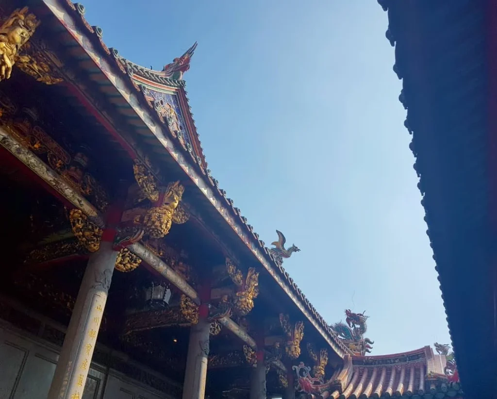 Keelung Taipei Cruise Port: Our Complete Guide + Insider Tips 2026 (Visited Once in 2019 by Danny and Peter) 26 Cruising with Danny and Peter, Holland America Line, Westerdam, Keelung, Taipei, Taiwan | Vibrant scene of Keelung Night Market showcasing diverse Taiwanese street food, including oyster pancakes and stinky tofu, with colorful stalls and lively crowds. Scenic views from Chaojing Park overlooking Keelung Harbor, featuring traditional architecture and lush landscapes. Picturesque images of Keelung Island attractions, highlighting pristine beaches and charming fishing villages, capturing the cultural heritage of Keelung and its rich maritime history.