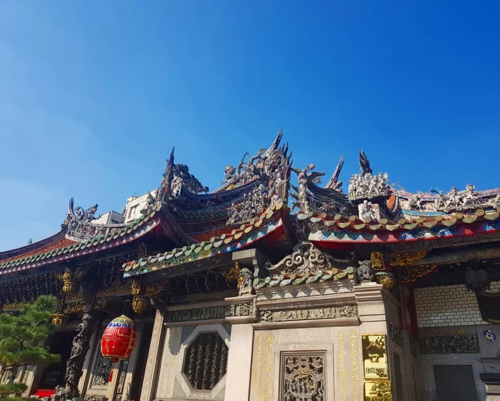 Keelung Taipei Cruise Port: Our Complete Guide + Insider Tips 2026 (Visited Once in 2019 by Danny and Peter) 27 Cruising with Danny and Peter, Holland America Line, Westerdam, Keelung, Taipei, Taiwan | Vibrant scene of Keelung Night Market showcasing diverse Taiwanese street food, including oyster pancakes and stinky tofu, with colorful stalls and lively crowds. Scenic views from Chaojing Park overlooking Keelung Harbor, featuring traditional architecture and lush landscapes. Picturesque images of Keelung Island attractions, highlighting pristine beaches and charming fishing villages, capturing the cultural heritage of Keelung and its rich maritime history.