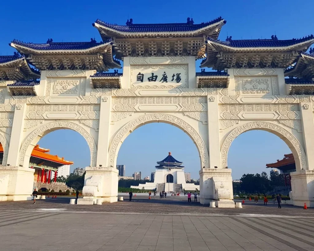 Keelung Taipei Cruise Port: Our Complete Guide + Insider Tips 2026 (Visited Once in 2019 by Danny and Peter) 37 Cruising with Danny and Peter, Holland America Line, Westerdam, Keelung, Taipei, Taiwan | Vibrant scene of Keelung Night Market showcasing diverse Taiwanese street food, including oyster pancakes and stinky tofu, with colorful stalls and lively crowds. Scenic views from Chaojing Park overlooking Keelung Harbor, featuring traditional architecture and lush landscapes. Picturesque images of Keelung Island attractions, highlighting pristine beaches and charming fishing villages, capturing the cultural heritage of Keelung and its rich maritime history.