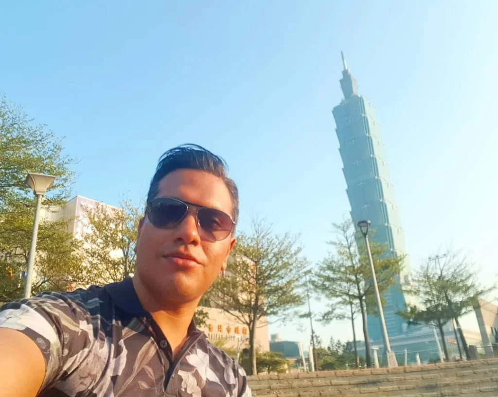 Keelung Taipei Cruise Port: Our Complete Guide + Insider Tips 2026 (Visited Once in 2019 by Danny and Peter) 38 Cruising with Danny and Peter, Holland America Line, Westerdam, Keelung, Taipei, Taiwan | Vibrant scene of Keelung Night Market showcasing diverse Taiwanese street food, including oyster pancakes and stinky tofu, with colorful stalls and lively crowds. Scenic views from Chaojing Park overlooking Keelung Harbor, featuring traditional architecture and lush landscapes. Picturesque images of Keelung Island attractions, highlighting pristine beaches and charming fishing villages, capturing the cultural heritage of Keelung and its rich maritime history.