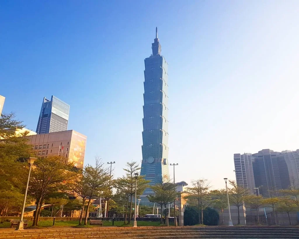 Keelung Taipei Cruise Port: Our Complete Guide + Insider Tips 2026 (Visited Once in 2019 by Danny and Peter) 39 Cruising with Danny and Peter, Holland America Line, Westerdam, Keelung, Taipei, Taiwan | Vibrant scene of Keelung Night Market showcasing diverse Taiwanese street food, including oyster pancakes and stinky tofu, with colorful stalls and lively crowds. Scenic views from Chaojing Park overlooking Keelung Harbor, featuring traditional architecture and lush landscapes. Picturesque images of Keelung Island attractions, highlighting pristine beaches and charming fishing villages, capturing the cultural heritage of Keelung and its rich maritime history.