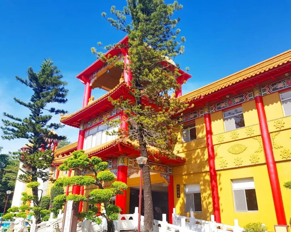 Cruising with Danny and Peter, Holland America Line, Westerdam, Kaohsiung, Taiwan | A serene Buddhist temple in Kaohsiung, showcasing intricate artwork and vibrant colors, representing the city's cultural heritage; beautiful views of Lotus Lake with picturesque pagodas and blooming lotus flowers, capturing the stunning natural landscapes; a bustling street food market with vendors offering local delicacies, highlighting Kaohsiung's vibrant local cuisine and inviting visitors to join a memorable street food tour.