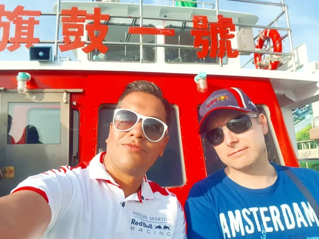 Cruising with Danny and Peter, Holland America Line, Westerdam, Kaohsiung, Taiwan | A serene Buddhist temple in Kaohsiung, showcasing intricate artwork and vibrant colors, representing the city's cultural heritage; beautiful views of Lotus Lake with picturesque pagodas and blooming lotus flowers, capturing the stunning natural landscapes; a bustling street food market with vendors offering local delicacies, highlighting Kaohsiung's vibrant local cuisine and inviting visitors to join a memorable street food tour.