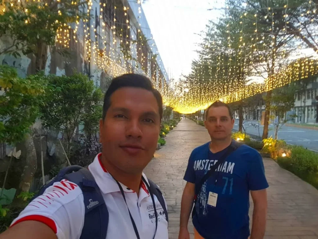 Cruising with Danny and Peter, Holland America Line, Westerdam, Kaohsiung, Taiwan | A serene Buddhist temple in Kaohsiung, showcasing intricate artwork and vibrant colors, representing the city's cultural heritage; beautiful views of Lotus Lake with picturesque pagodas and blooming lotus flowers, capturing the stunning natural landscapes; a bustling street food market with vendors offering local delicacies, highlighting Kaohsiung's vibrant local cuisine and inviting visitors to join a memorable street food tour.