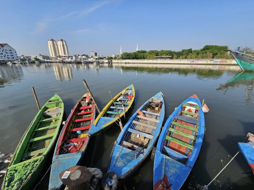 Cruising with Danny and Peter, Holland America Line, Westerdam, Tanjung Priok, Jakarta, Java, Indonesia | Experience Jakarta's rich heritage and culinary delights: Tanjung Priok Port highlights its bustling maritime history, while historic Phinisi schooners at Sunda Kelapa and Dutch colonial architecture in Batavia Stad reflect Jakarta’s past. Enjoy panoramic views from Monas National Monument and savor a delicious Indonesian buffet lunch showcasing traditional dishes. Explore Taman Mini Indonesia Indah to see diverse cultural pavilions representing Indonesia's rich heritage.
