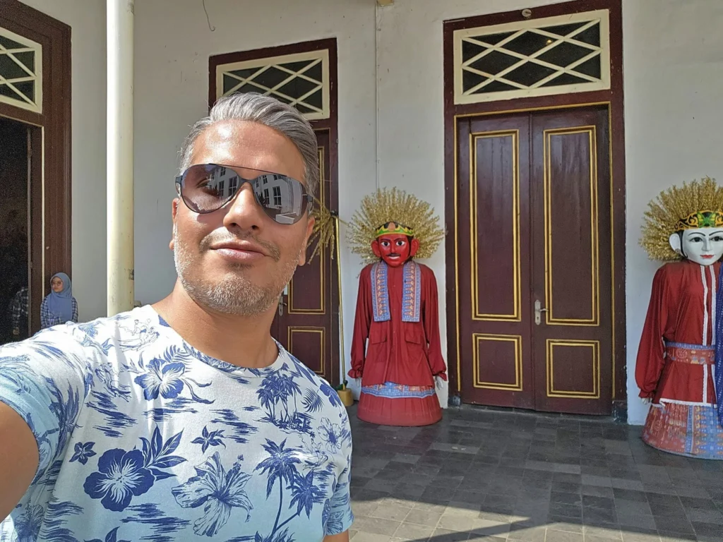 Cruising with Danny and Peter, Holland America Line, Westerdam, Tanjung Priok, Jakarta, Java, Indonesia | Experience Jakarta's rich heritage and culinary delights: Tanjung Priok Port highlights its bustling maritime history, while historic Phinisi schooners at Sunda Kelapa and Dutch colonial architecture in Batavia Stad reflect Jakarta’s past. Enjoy panoramic views from Monas National Monument and savor a delicious Indonesian buffet lunch showcasing traditional dishes. Explore Taman Mini Indonesia Indah to see diverse cultural pavilions representing Indonesia's rich heritage.