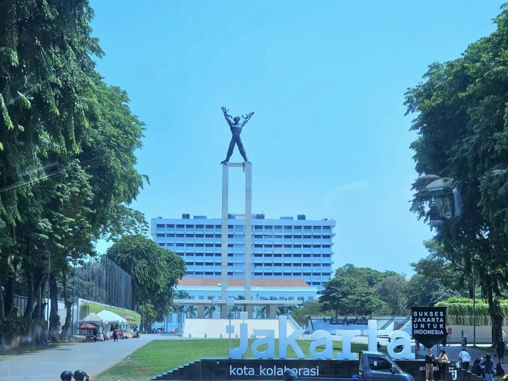 Cruising with Danny and Peter, Holland America Line, Westerdam, Tanjung Priok, Jakarta, Java, Indonesia | Experience Jakarta's rich heritage and culinary delights: Tanjung Priok Port highlights its bustling maritime history, while historic Phinisi schooners at Sunda Kelapa and Dutch colonial architecture in Batavia Stad reflect Jakarta’s past. Enjoy panoramic views from Monas National Monument and savor a delicious Indonesian buffet lunch showcasing traditional dishes. Explore Taman Mini Indonesia Indah to see diverse cultural pavilions representing Indonesia's rich heritage.