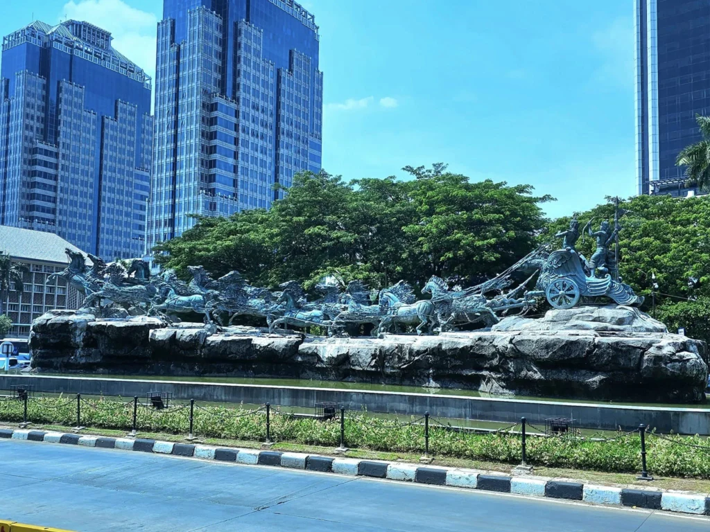 Cruising with Danny and Peter, Holland America Line, Westerdam, Tanjung Priok, Jakarta, Java, Indonesia | Experience Jakarta's rich heritage and culinary delights: Tanjung Priok Port highlights its bustling maritime history, while historic Phinisi schooners at Sunda Kelapa and Dutch colonial architecture in Batavia Stad reflect Jakarta’s past. Enjoy panoramic views from Monas National Monument and savor a delicious Indonesian buffet lunch showcasing traditional dishes. Explore Taman Mini Indonesia Indah to see diverse cultural pavilions representing Indonesia's rich heritage.