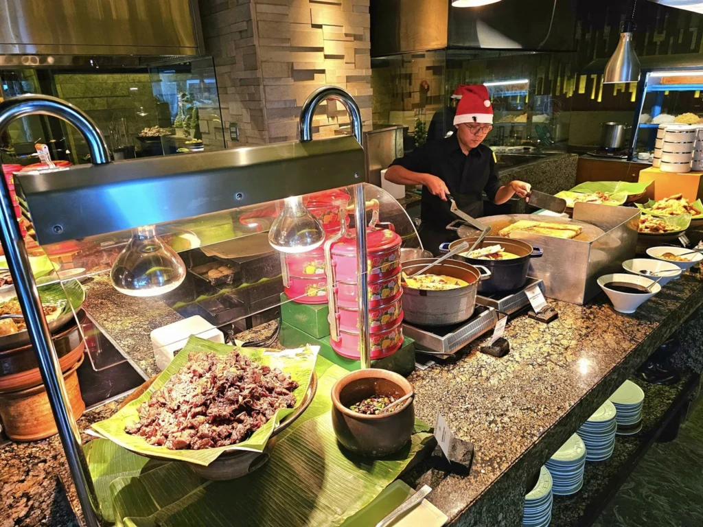 Cruising with Danny and Peter, Holland America Line, Westerdam, Tanjung Priok, Jakarta, Java, Indonesia | Experience Jakarta's rich heritage and culinary delights: Tanjung Priok Port highlights its bustling maritime history, while historic Phinisi schooners at Sunda Kelapa and Dutch colonial architecture in Batavia Stad reflect Jakarta’s past. Enjoy panoramic views from Monas National Monument and savor a delicious Indonesian buffet lunch showcasing traditional dishes. Explore Taman Mini Indonesia Indah to see diverse cultural pavilions representing Indonesia's rich heritage.