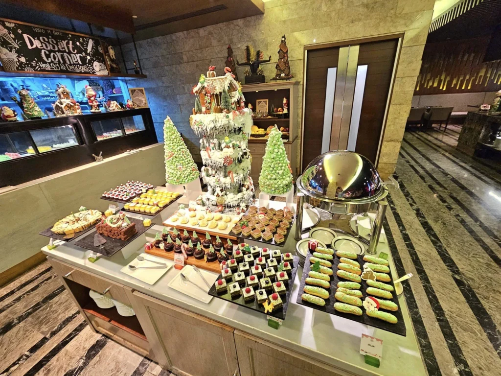 Cruising with Danny and Peter, Holland America Line, Westerdam, Tanjung Priok, Jakarta, Java, Indonesia | Experience Jakarta's rich heritage and culinary delights: Tanjung Priok Port highlights its bustling maritime history, while historic Phinisi schooners at Sunda Kelapa and Dutch colonial architecture in Batavia Stad reflect Jakarta’s past. Enjoy panoramic views from Monas National Monument and savor a delicious Indonesian buffet lunch showcasing traditional dishes. Explore Taman Mini Indonesia Indah to see diverse cultural pavilions representing Indonesia's rich heritage.