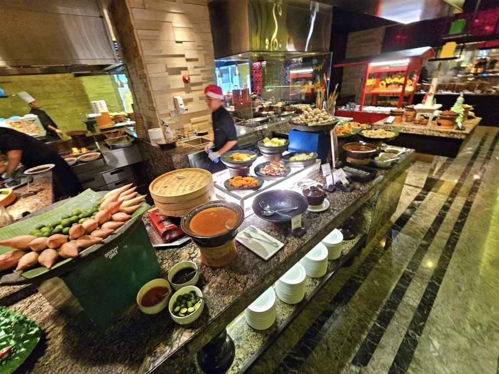 Cruising with Danny and Peter, Holland America Line, Westerdam, Tanjung Priok, Jakarta, Java, Indonesia | Experience Jakarta's rich heritage and culinary delights: Tanjung Priok Port highlights its bustling maritime history, while historic Phinisi schooners at Sunda Kelapa and Dutch colonial architecture in Batavia Stad reflect Jakarta’s past. Enjoy panoramic views from Monas National Monument and savor a delicious Indonesian buffet lunch showcasing traditional dishes. Explore Taman Mini Indonesia Indah to see diverse cultural pavilions representing Indonesia's rich heritage.