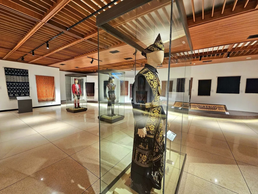 Cruising with Danny and Peter, Holland America Line, Westerdam, Tanjung Priok, Jakarta, Java, Indonesia | Experience Jakarta's rich heritage and culinary delights: Tanjung Priok Port highlights its bustling maritime history, while historic Phinisi schooners at Sunda Kelapa and Dutch colonial architecture in Batavia Stad reflect Jakarta’s past. Enjoy panoramic views from Monas National Monument and savor a delicious Indonesian buffet lunch showcasing traditional dishes. Explore Taman Mini Indonesia Indah to see diverse cultural pavilions representing Indonesia's rich heritage.