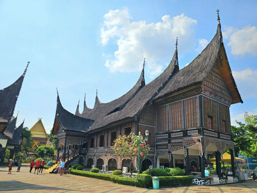 Cruising with Danny and Peter, Holland America Line, Westerdam, Tanjung Priok, Jakarta, Java, Indonesia | Experience Jakarta's rich heritage and culinary delights: Tanjung Priok Port highlights its bustling maritime history, while historic Phinisi schooners at Sunda Kelapa and Dutch colonial architecture in Batavia Stad reflect Jakarta’s past. Enjoy panoramic views from Monas National Monument and savor a delicious Indonesian buffet lunch showcasing traditional dishes. Explore Taman Mini Indonesia Indah to see diverse cultural pavilions representing Indonesia's rich heritage.