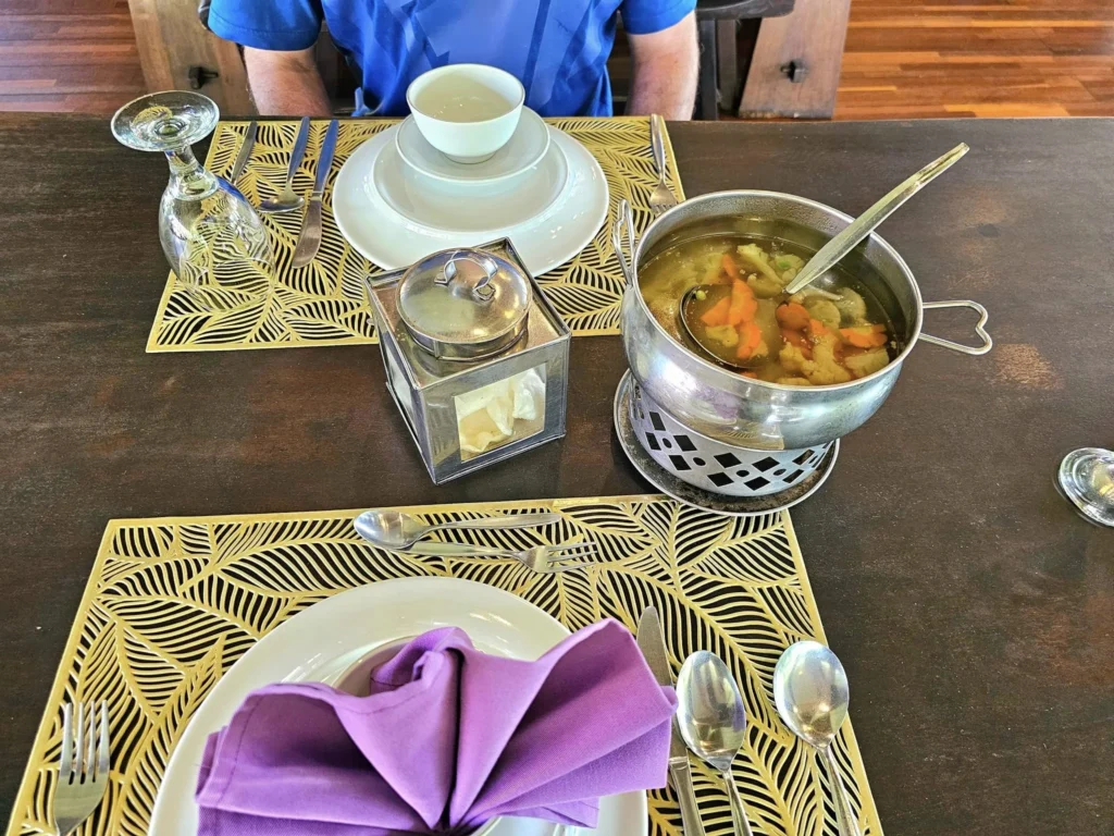 Cruising with Danny and Peter, Holland America Line, Westerdam, Semarang, Java, Indonesia, Borobudur Temple Cruise, Java Adventure | Panoramic view of Borobudur during a Borobudur Temple Cruise, showcasing the UNESCO Buddhist Temple amidst Central Java’s lush hills, with the Westerdam ship docked for the Holland America Westerdam Borobudur Tour, a Luxury Cruise Java adventure in Holland America Far East. Close-up of stupas and Buddha statues at Borobudur, reflecting Mahayana Buddhist Heritage, alongside a vibrant market scene from a Semarang Java Tour, part of an Indonesian Cultural Journey. Travelers explore this Borobudur Pilgrimage Site on a Central Java Travel excursion, enjoying a stunning sunset over the 9th-Century Temple Exploration, with detailed stone reliefs of the UNESCO Buddhist Temple and relaxation on the Westerdam deck during a Westerdam Cruise Indonesia.