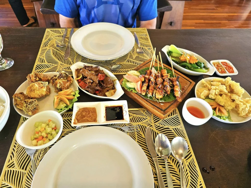 Cruising with Danny and Peter, Holland America Line, Westerdam, Semarang, Java, Indonesia, Borobudur Temple Cruise, Java Adventure | Panoramic view of Borobudur during a Borobudur Temple Cruise, showcasing the UNESCO Buddhist Temple amidst Central Java’s lush hills, with the Westerdam ship docked for the Holland America Westerdam Borobudur Tour, a Luxury Cruise Java adventure in Holland America Far East. Close-up of stupas and Buddha statues at Borobudur, reflecting Mahayana Buddhist Heritage, alongside a vibrant market scene from a Semarang Java Tour, part of an Indonesian Cultural Journey. Travelers explore this Borobudur Pilgrimage Site on a Central Java Travel excursion, enjoying a stunning sunset over the 9th-Century Temple Exploration, with detailed stone reliefs of the UNESCO Buddhist Temple and relaxation on the Westerdam deck during a Westerdam Cruise Indonesia.