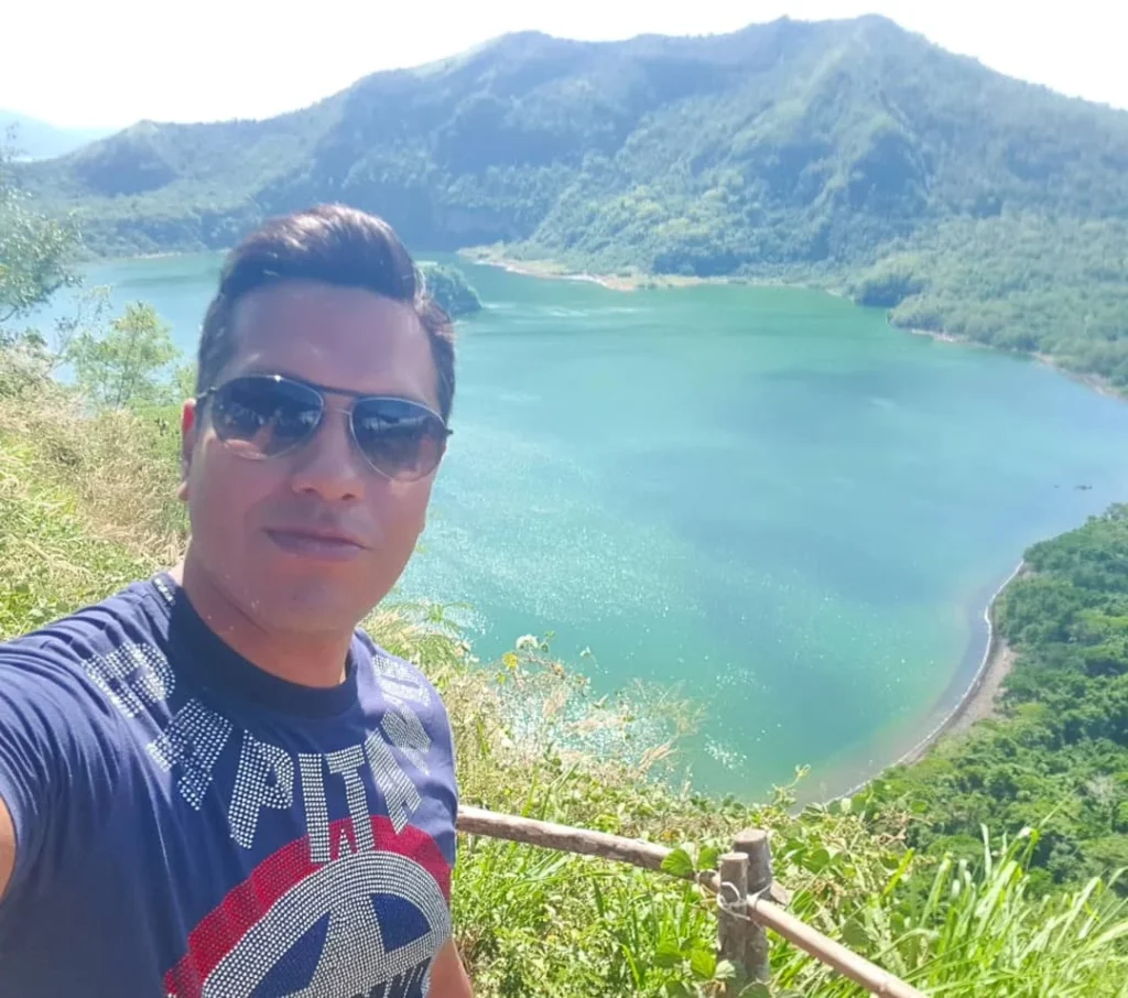 Cruising with Danny and Peter, Holland America Line, Westerdam, Manila, Philippines | Scenic boat ride across the lake to Taal Volcano, part of a thrilling Manila Volcano Adventure. Horseback riding through the lush countryside, leading to a volcanic crater trek and the breathtaking views from Taal's summit. A memorable countryside escape from Manila to the volcano, showcasing the natural beauty of the Philippines, with stunning landscapes, panoramic vistas, and outdoor adventure near Manila. The volcano summit experience highlights lakeside volcanic exploration and a unique Manila day trip to Taal Volcano.