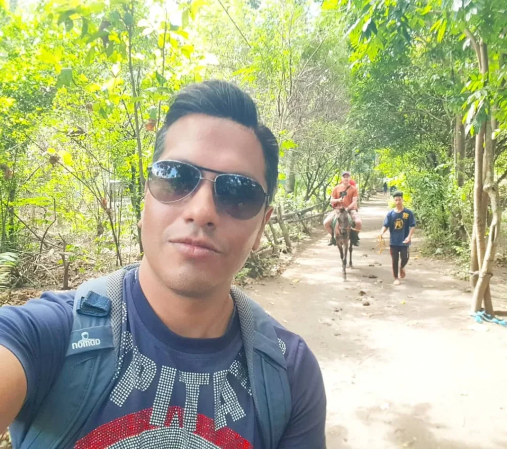 Cruising with Danny and Peter, Holland America Line, Westerdam, Manila, Philippines | Scenic boat ride across the lake to Taal Volcano, part of a thrilling Manila Volcano Adventure. Horseback riding through the lush countryside, leading to a volcanic crater trek and the breathtaking views from Taal's summit. A memorable countryside escape from Manila to the volcano, showcasing the natural beauty of the Philippines, with stunning landscapes, panoramic vistas, and outdoor adventure near Manila. The volcano summit experience highlights lakeside volcanic exploration and a unique Manila day trip to Taal Volcano.