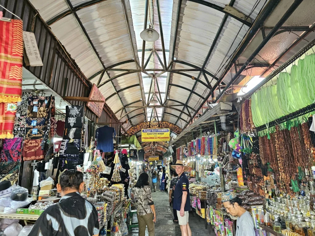 Cruising with Danny and Peter, Holland America Line, Westerdam, Surabaya, Indonesia, Surabaya Private Tour, Cultural Journey | Exploring Surabaya’s oldest Buddhist temple with intricate carvings, vibrant Arab Street bustling with spices, colorful local market stalls with fresh produce, ancient artifacts at the National Museum, and Holland America’s Westerdam docked for a Surabaya Private Tour. This Private Cultural Tour Surabaya includes a Surabaya Temple Tour, Surabaya Cultural Exploration, Surabaya Market Adventure, Surabaya Heritage Walk, and Westerdam Cruise Excursion with a Surabaya City Guide, showcasing a Customized Tour Surabaya and Private Sightseeing Surabaya experience.