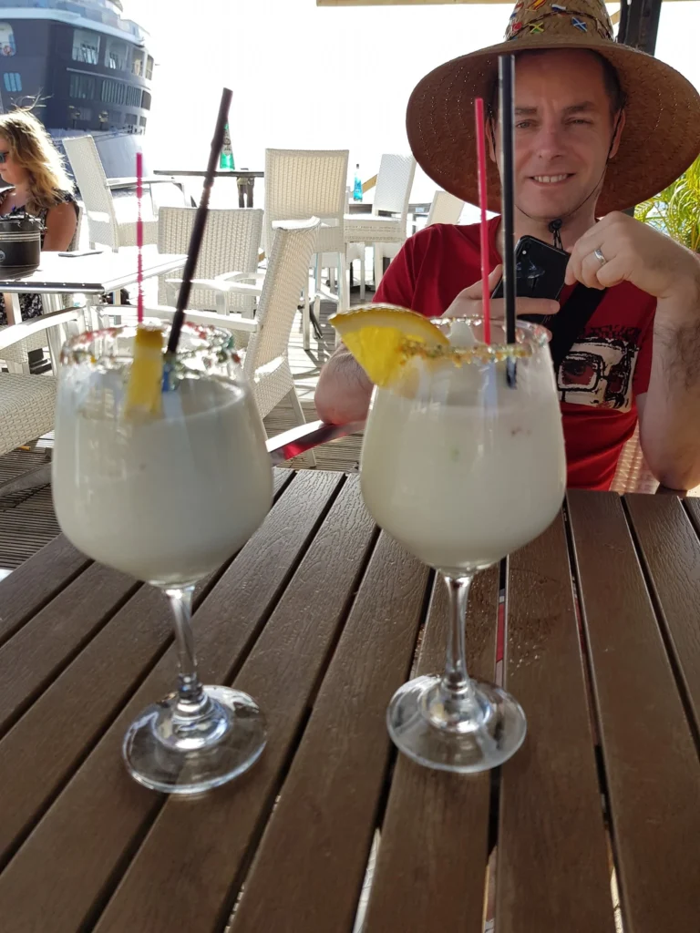 Cruising with Danny and Peter, Holland America Line, Zuiderdam, Kralendijk, Bonaire | A vibrant underwater scene showcasing colorful coral reefs and diverse marine life during a snorkeling adventure in Kralendijk, Bonaire, with tropical waters inviting exploration.