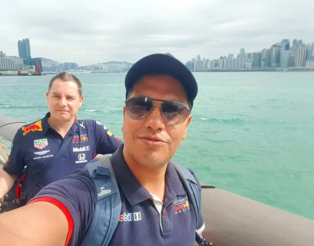 Cruising with Danny and Peter, Holland America Line, Westerdam, Hong Kong, China | A vibrant street in Kun Tong District, Hong Kong, showcasing colorful street art and local markets filled with fresh produce, reflecting the unique blend of traditional and modern Hong Kong culture, highlighting the culinary delights and bustling atmosphere of this captivating neighborhood.