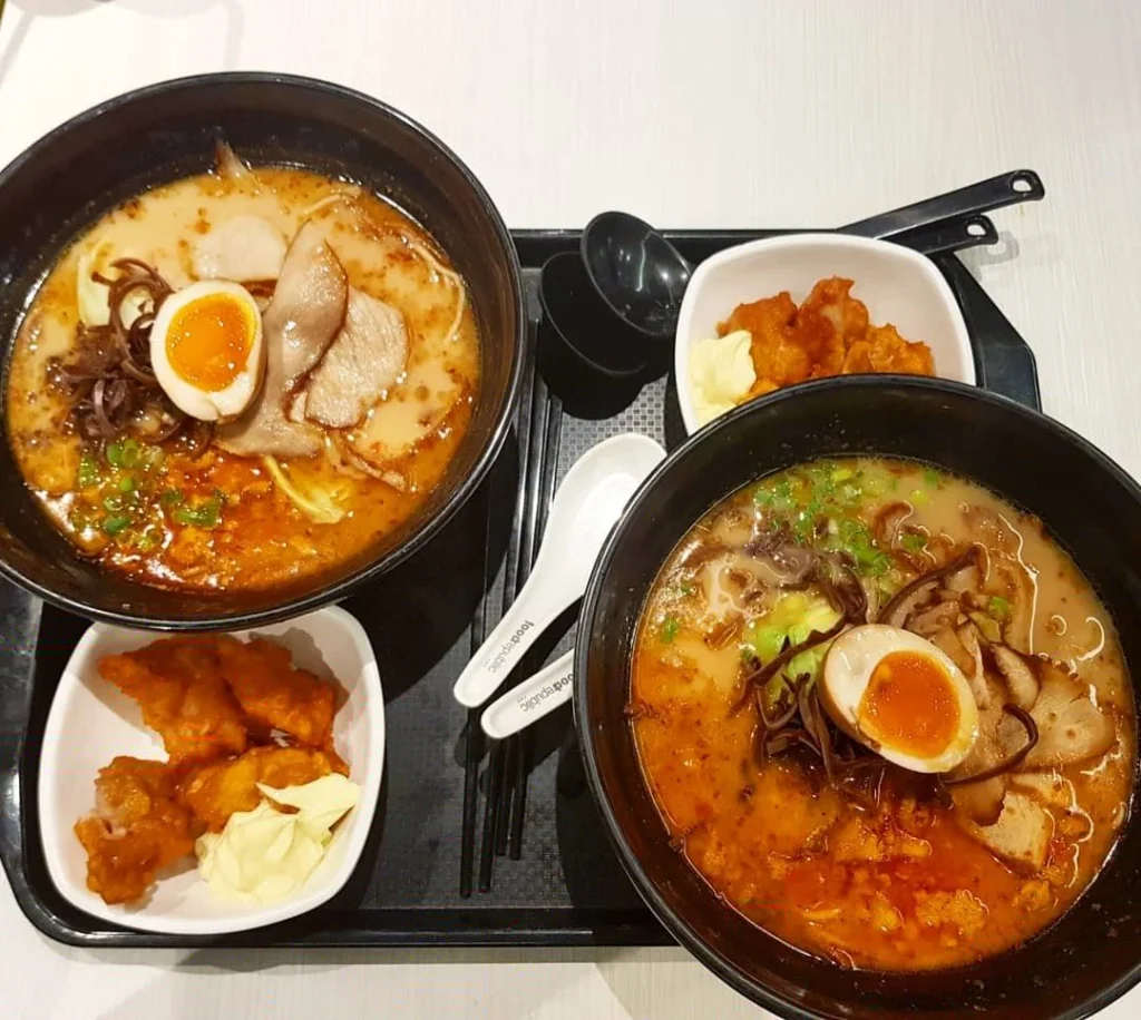 Cruising with Danny and Peter, Holland America Line, Westerdam, Hong Kong, China | A vibrant street in Kun Tong District, Hong Kong, showcasing colorful street art and local markets filled with fresh produce, reflecting the unique blend of traditional and modern Hong Kong culture, highlighting the culinary delights and bustling atmosphere of this captivating neighborhood.