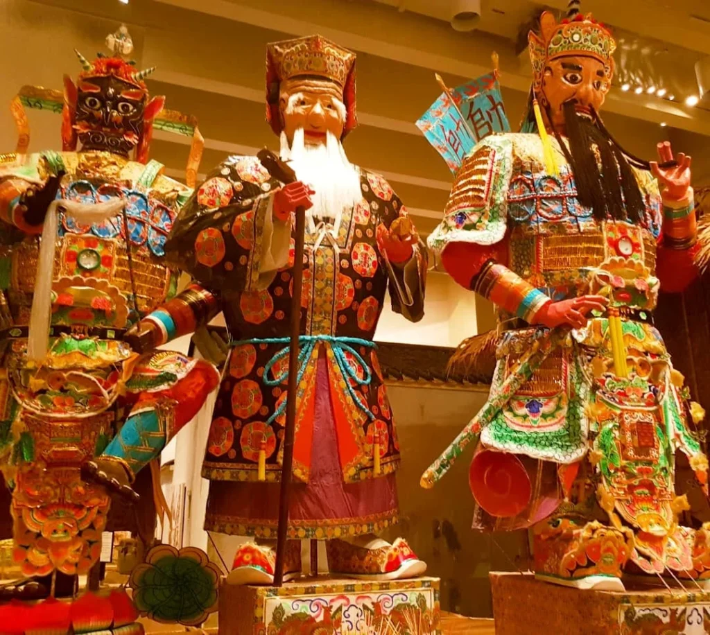 Cruising with Danny and Peter, Holland America Line, Westerdam, Hong Kong, China | A vibrant street in Kun Tong District, Hong Kong, showcasing colorful street art and local markets filled with fresh produce, reflecting the unique blend of traditional and modern Hong Kong culture, highlighting the culinary delights and bustling atmosphere of this captivating neighborhood.