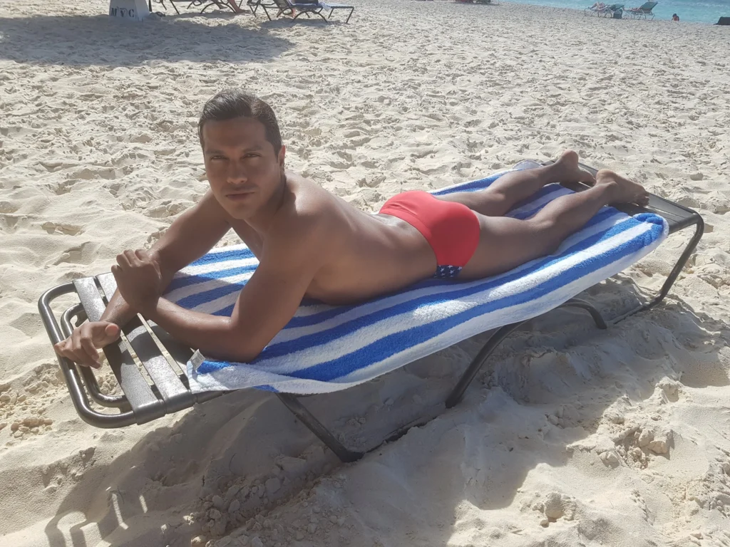 Cruising with Danny and Peter, Holland America Line, Zuiderdam, Oranjestad, Aruba | Vibrant view of Oranjestad Beach with powdery sands and turquoise waters during a relaxing beach day in Aruba, showcasing local beachfront dining and coastal activities.