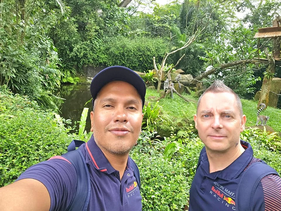 Cruising with Danny and Peter, Holland America Line, Westerdam, Singapore, Singapore Zoo Experience 5 Highlights | Exploring the Singapore Zoo Experience: A lush Rainforest Adventure Singapore in the Fragile Forest with butterflies and sloths, kids enjoying Rainforest Kidzworld—a Family-Friendly Zoo Singapore highlight of the Singapore Zoo Conservation Adventure—with water slides and monkeys promoting Nature Education Singapore, lions and baboons in the Great Rift Valley of Ethiopia Singapore Zoo Exhibit showcasing Singapore Wildlife Adventure and Ecotourism in Singapore, signage highlighting Conservation Efforts Zoo emphasizing Sustainable Tourism Singapore, all at the entrance to this Wildlife Sanctuary Singapore offering top Singapore Zoo Attractions.