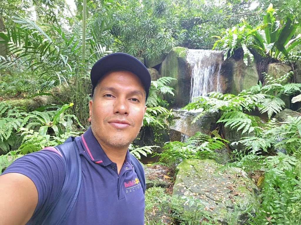 Cruising with Danny and Peter, Holland America Line, Westerdam, Singapore, Singapore Zoo Experience 5 Highlights | Exploring the Singapore Zoo Experience: A lush Rainforest Adventure Singapore in the Fragile Forest with butterflies and sloths, kids enjoying Rainforest Kidzworld—a Family-Friendly Zoo Singapore highlight of the Singapore Zoo Conservation Adventure—with water slides and monkeys promoting Nature Education Singapore, lions and baboons in the Great Rift Valley of Ethiopia Singapore Zoo Exhibit showcasing Singapore Wildlife Adventure and Ecotourism in Singapore, signage highlighting Conservation Efforts Zoo emphasizing Sustainable Tourism Singapore, all at the entrance to this Wildlife Sanctuary Singapore offering top Singapore Zoo Attractions.