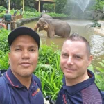 Cruising with Danny and Peter, Holland America Line, Westerdam, Singapore, Singapore Zoo Experience 5 Highlights | Exploring the Singapore Zoo Experience: A lush Rainforest Adventure Singapore in the Fragile Forest with butterflies and sloths, kids enjoying Rainforest Kidzworld—a Family-Friendly Zoo Singapore highlight of the Singapore Zoo Conservation Adventure—with water slides and monkeys promoting Nature Education Singapore, lions and baboons in the Great Rift Valley of Ethiopia Singapore Zoo Exhibit showcasing Singapore Wildlife Adventure and Ecotourism in Singapore, signage highlighting Conservation Efforts Zoo emphasizing Sustainable Tourism Singapore, all at the entrance to this Wildlife Sanctuary Singapore offering top Singapore Zoo Attractions.