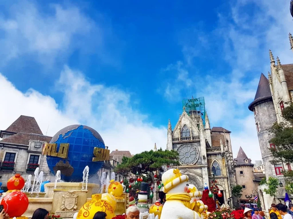 Cruising with Danny and Peter, Holland America Line, Westerdam, Da Nang, Hue, Vietnam | Stunning views of Bana Hills Marble Mountains in Vietnam, featuring the iconic Golden Bridge held by giant stone hands, the charming French Village, and serene Vietnamese Buddhist sanctuaries nestled within the lush limestone hills.