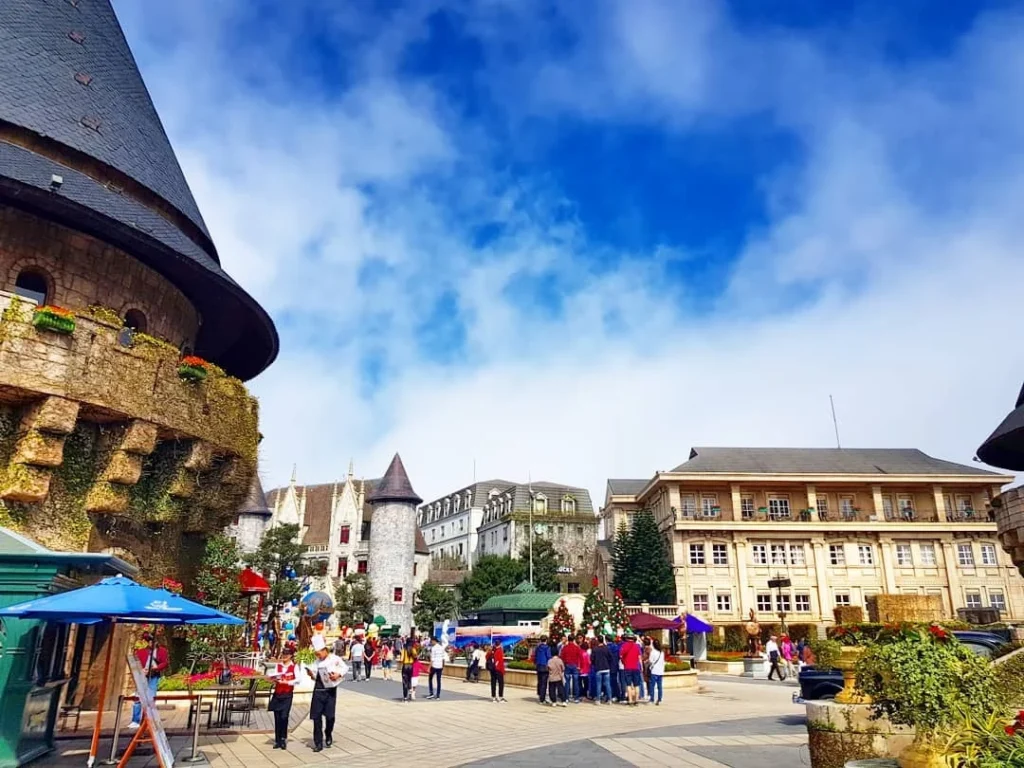 Cruising with Danny and Peter, Holland America Line, Westerdam, Da Nang, Hue, Vietnam | Stunning views of Bana Hills Marble Mountains in Vietnam, featuring the iconic Golden Bridge held by giant stone hands, the charming French Village, and serene Vietnamese Buddhist sanctuaries nestled within the lush limestone hills.