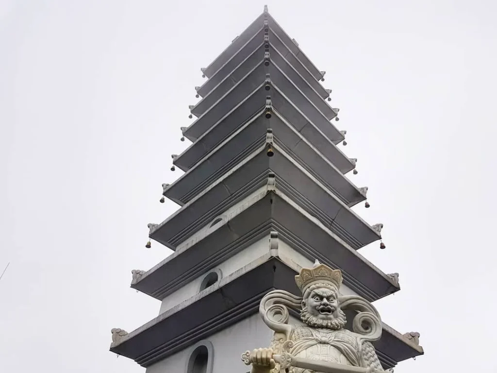 Cruising with Danny and Peter, Holland America Line, Westerdam, Da Nang, Hue, Vietnam | Stunning views of Bana Hills Marble Mountains in Vietnam, featuring the iconic Golden Bridge held by giant stone hands, the charming French Village, and serene Vietnamese Buddhist sanctuaries nestled within the lush limestone hills.