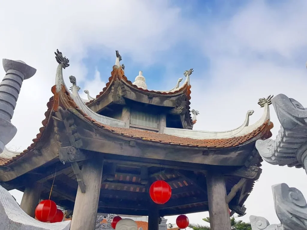 Cruising with Danny and Peter, Holland America Line, Westerdam, Da Nang, Hue, Vietnam | Stunning views of Bana Hills Marble Mountains in Vietnam, featuring the iconic Golden Bridge held by giant stone hands, the charming French Village, and serene Vietnamese Buddhist sanctuaries nestled within the lush limestone hills.