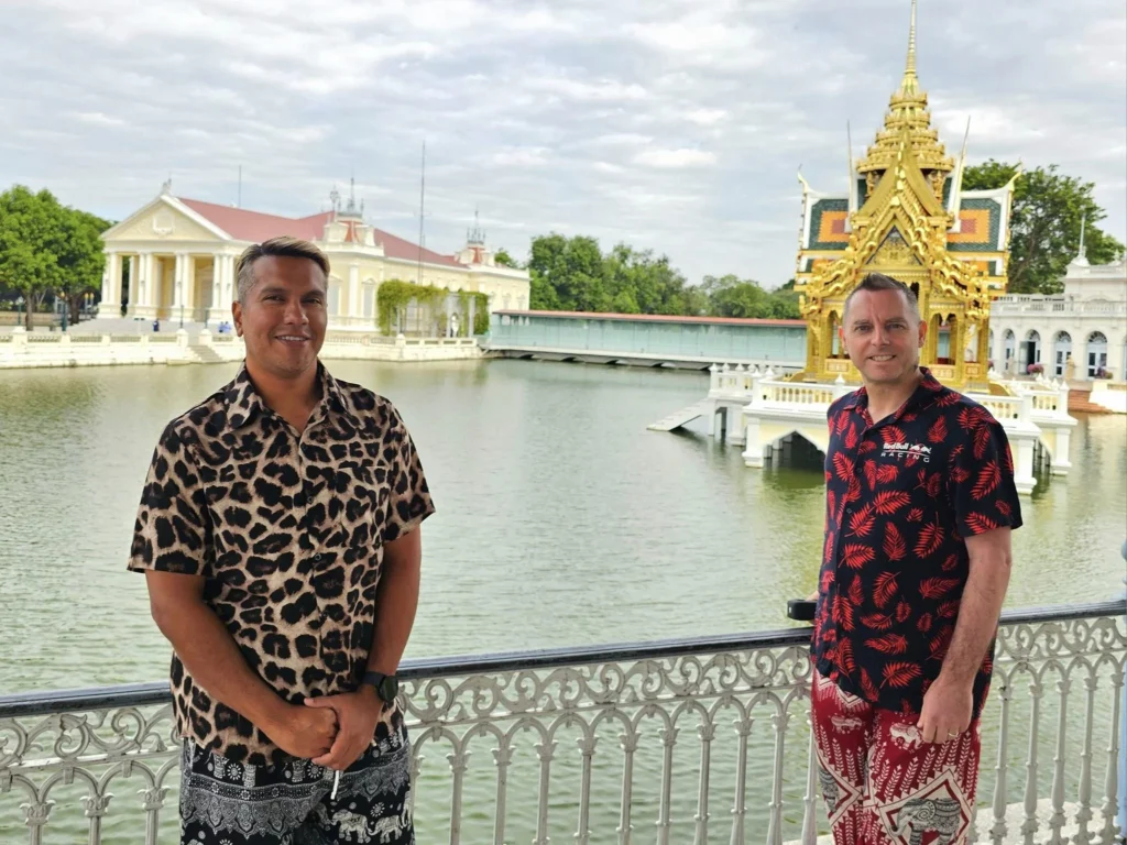 A Majestic Journey: Unveiling the Royal Historical Tour Ayutthaya from the Holland America Cruise 2 Cruising with Danny and Peter, Holland America Line, Westerdam, Laem Chabang, Bangkok, Thailand, Royal Historical Tour Ayutthaya 5 Glorious Stops | Exploring the Royal Historical Tour Ayutthaya and Bang Pa In Ayutthaya with lush gardens at Bang Pa In Palace, the elegant Aisawan Dhipaya Pavilion on a tranquil lake, towering stupa and Buddha statues at Ayutthaya Temples, colorful Traditional Thai Cuisine, and the iconic Buddha head in tree roots at Wat Mahathat Ruins—a UNESCO Heritage Site—all part of an unforgettable Thailand Cultural Tour and Ayutthaya Day Trip from the Holland America Cruise, showcasing Thai Royal History.