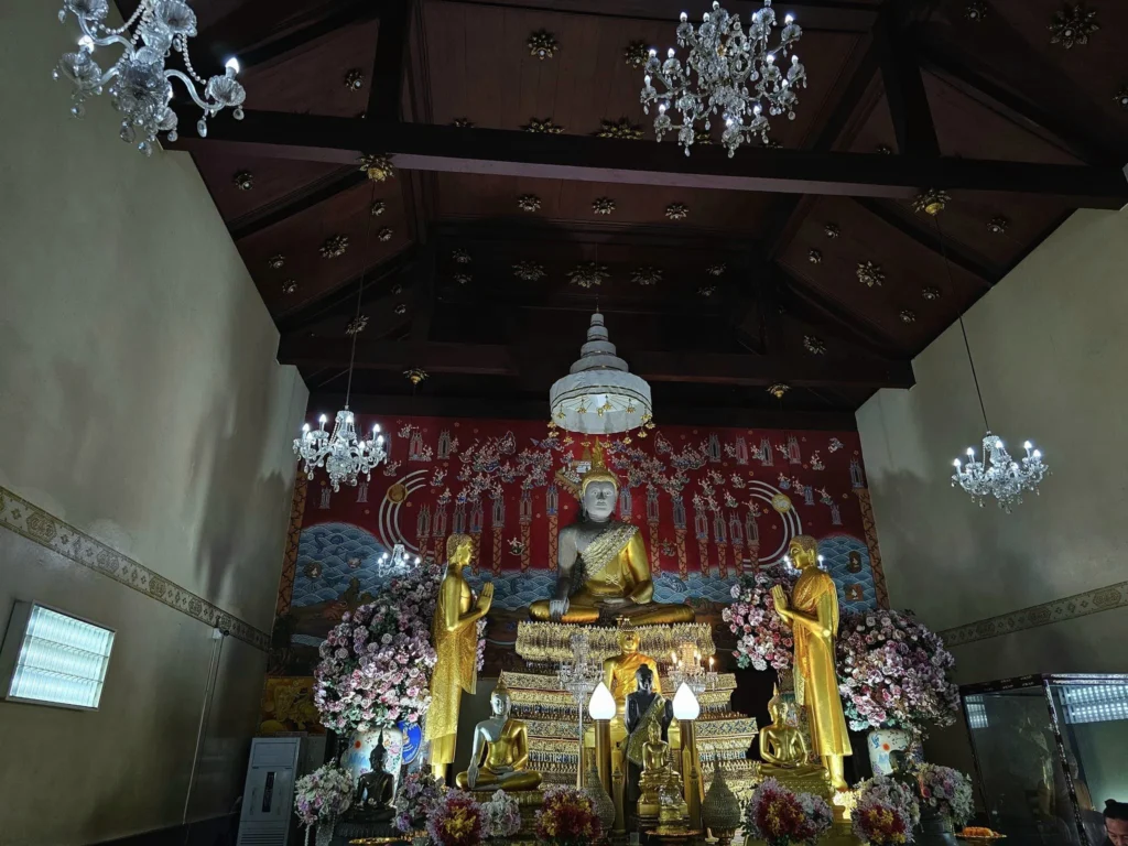 A Majestic Journey: Unveiling the Royal Historical Tour Ayutthaya from the Holland America Cruise 35 Cruising with Danny and Peter, Holland America Line, Westerdam, Laem Chabang, Bangkok, Thailand, Royal Historical Tour Ayutthaya 5 Glorious Stops | Exploring the Royal Historical Tour Ayutthaya and Bang Pa In Ayutthaya with lush gardens at Bang Pa In Palace, the elegant Aisawan Dhipaya Pavilion on a tranquil lake, towering stupa and Buddha statues at Ayutthaya Temples, colorful Traditional Thai Cuisine, and the iconic Buddha head in tree roots at Wat Mahathat Ruins—a UNESCO Heritage Site—all part of an unforgettable Thailand Cultural Tour and Ayutthaya Day Trip from the Holland America Cruise, showcasing Thai Royal History.