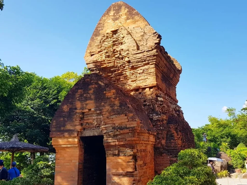 Cruising with Danny and Peter, Holland America Line, Westerdam, Nha Trang, Vietnam | Vibrant local markets in Nha Trang showcasing fresh produce and street food during a Nha Trang tour experience; scenic river cruise views with lush landscapes; delicious Vietnamese dishes like pho and banh mi from a Nha Trang food tour; historical sites featuring ancient temples and architecture in Nha Trang, Vietnam.
