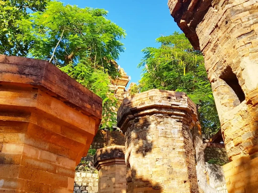 Cruising with Danny and Peter, Holland America Line, Westerdam, Nha Trang, Vietnam | Vibrant local markets in Nha Trang showcasing fresh produce and street food during a Nha Trang tour experience; scenic river cruise views with lush landscapes; delicious Vietnamese dishes like pho and banh mi from a Nha Trang food tour; historical sites featuring ancient temples and architecture in Nha Trang, Vietnam.