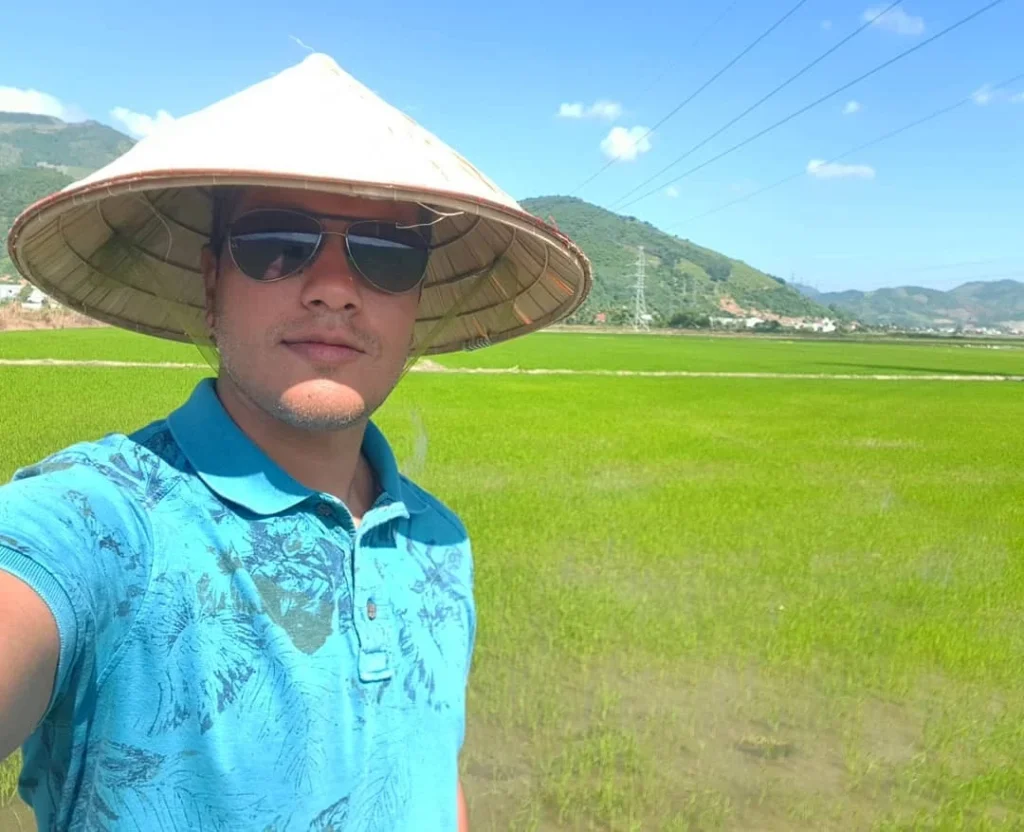 Cruising with Danny and Peter, Holland America Line, Westerdam, Nha Trang, Vietnam | Vibrant local markets in Nha Trang showcasing fresh produce and street food during a Nha Trang tour experience; scenic river cruise views with lush landscapes; delicious Vietnamese dishes like pho and banh mi from a Nha Trang food tour; historical sites featuring ancient temples and architecture in Nha Trang, Vietnam.