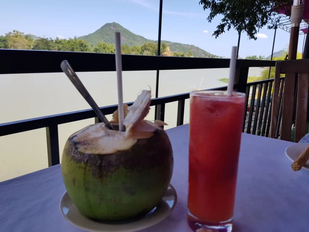 Cruising with Danny and Peter, Holland America Line, Westerdam, Nha Trang, Vietnam | Vibrant local markets in Nha Trang showcasing fresh produce and street food during a Nha Trang tour experience; scenic river cruise views with lush landscapes; delicious Vietnamese dishes like pho and banh mi from a Nha Trang food tour; historical sites featuring ancient temples and architecture in Nha Trang, Vietnam.