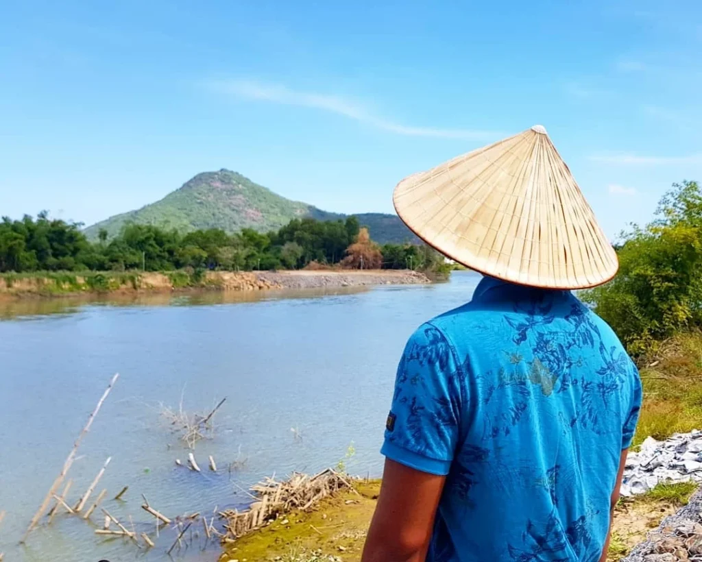 Cruising with Danny and Peter, Holland America Line, Westerdam, Nha Trang, Vietnam | Vibrant local markets in Nha Trang showcasing fresh produce and street food during a Nha Trang tour experience; scenic river cruise views with lush landscapes; delicious Vietnamese dishes like pho and banh mi from a Nha Trang food tour; historical sites featuring ancient temples and architecture in Nha Trang, Vietnam.