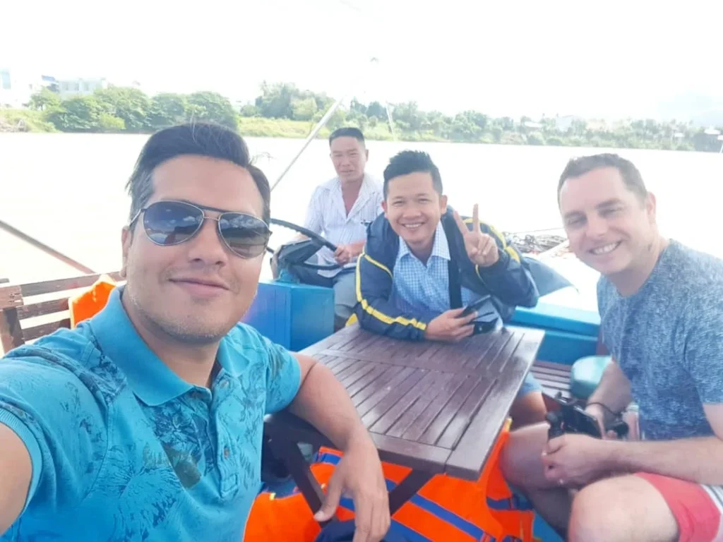 Cruising with Danny and Peter, Holland America Line, Westerdam, Nha Trang, Vietnam | Vibrant local markets in Nha Trang showcasing fresh produce and street food during a Nha Trang tour experience; scenic river cruise views with lush landscapes; delicious Vietnamese dishes like pho and banh mi from a Nha Trang food tour; historical sites featuring ancient temples and architecture in Nha Trang, Vietnam.