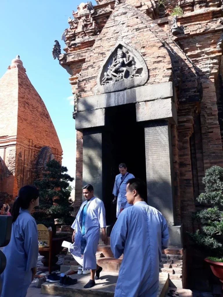 Cruising with Danny and Peter, Holland America Line, Westerdam, Nha Trang, Vietnam | Vibrant local markets in Nha Trang showcasing fresh produce and street food during a Nha Trang tour experience; scenic river cruise views with lush landscapes; delicious Vietnamese dishes like pho and banh mi from a Nha Trang food tour; historical sites featuring ancient temples and architecture in Nha Trang, Vietnam.