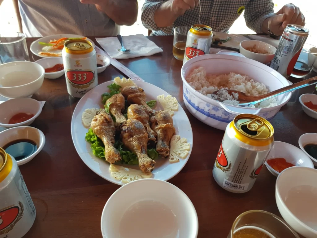 Cruising with Danny and Peter, Holland America Line, Westerdam, Phu My, Vietnam | Visitors exploring the Cu Chi Tunnels, a historic underground network used during the Vietnam War near Ho Chi Minh City, showcasing the Viet Cong's guerrilla tactics and the resilience of the Vietnamese people. The intricate tunnels of Cu Chi, complete with living quarters, are an iconic part of Vietnam's cultural heritage and historical sites, providing insight into underground warfare and the country's wartime history.