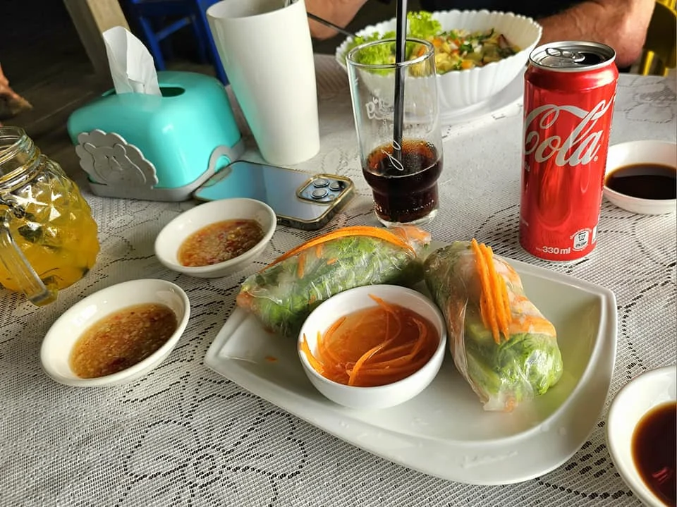 Cruising with Danny and Peter, Holland America Line, Westerdam, Sihanoukville, Cambodia, Cambodia Coastal Exploration | Golden sands and turquoise waves at Sihanoukville Beaches, busy Le Kep Crab Market with fresh crab and Kampot pepper, lush green vines at Kampot Pepper Farms, elegant French Colonial Architecture along Kampot riverside, and grilled fish with Kampot pepper at Fresh Seafood Cambodia stall—all captured during an unforgettable Cambodia Coastal Exploration and Cambodia Coastal Cultural Adventure with Holland America Westerdam in Cambodia’s coastal towns.