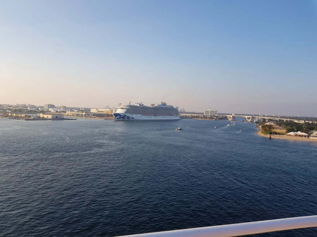 Cruising with Danny and Peter, Holland America Line, Nieuw Amsterdam, Fort Lauderdale, Florida, United States | A scenic view of a Fort Lauderdale river cruise adventure showcasing lush palm trees lining the waterways, luxury mansions along Millionaire's Row, and vibrant sunset reflections on the water, capturing the essence of a memorable canal cruise in Fort Lauderdale.