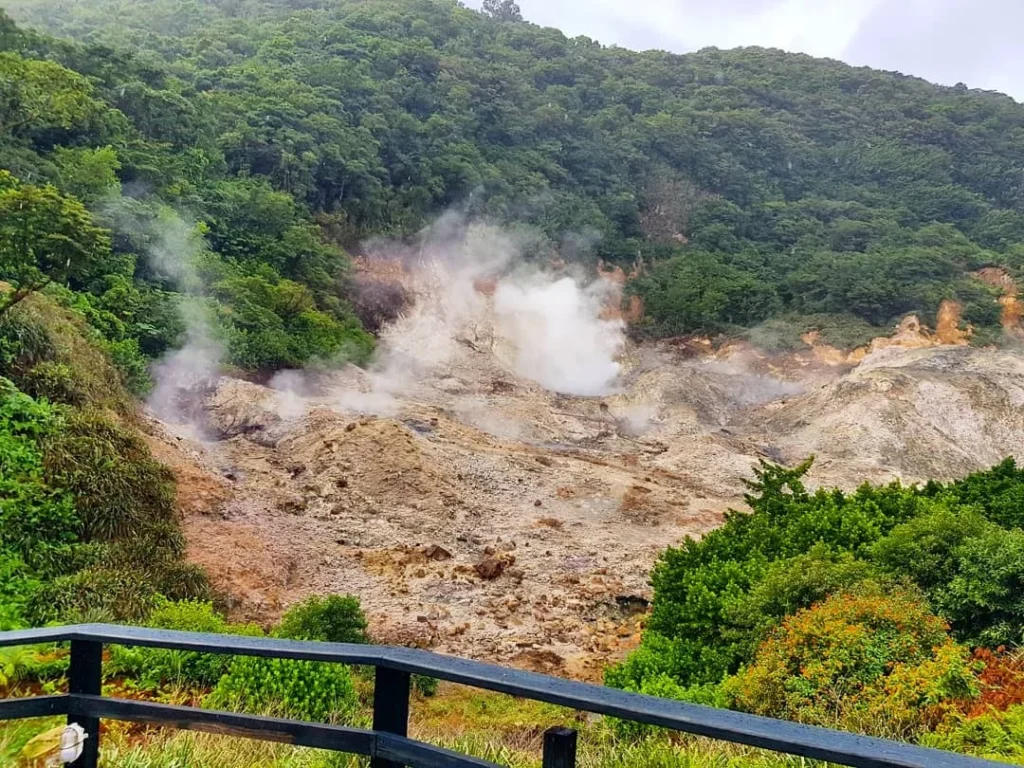 Cruising with Danny and Peter, Holland America Line, Zuiderdam, Castries, Saint Lucia | Castries Nature Expedition showcasing St. Lucia’s Black Sand Beach and Drive-In Volcano tour; includes scenic Caribbean black sand coastline, geothermal attractions with sulfur springs and mud pools, and volcanic crater views, offering an immersive St. Lucia eco-tour experience.