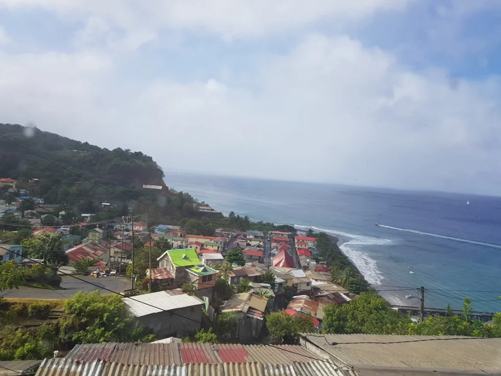 Cruising with Danny and Peter, Holland America Line, Zuiderdam, Castries, Saint Lucia | Castries Nature Expedition showcasing St. Lucia’s Black Sand Beach and Drive-In Volcano tour; includes scenic Caribbean black sand coastline, geothermal attractions with sulfur springs and mud pools, and volcanic crater views, offering an immersive St. Lucia eco-tour experience.