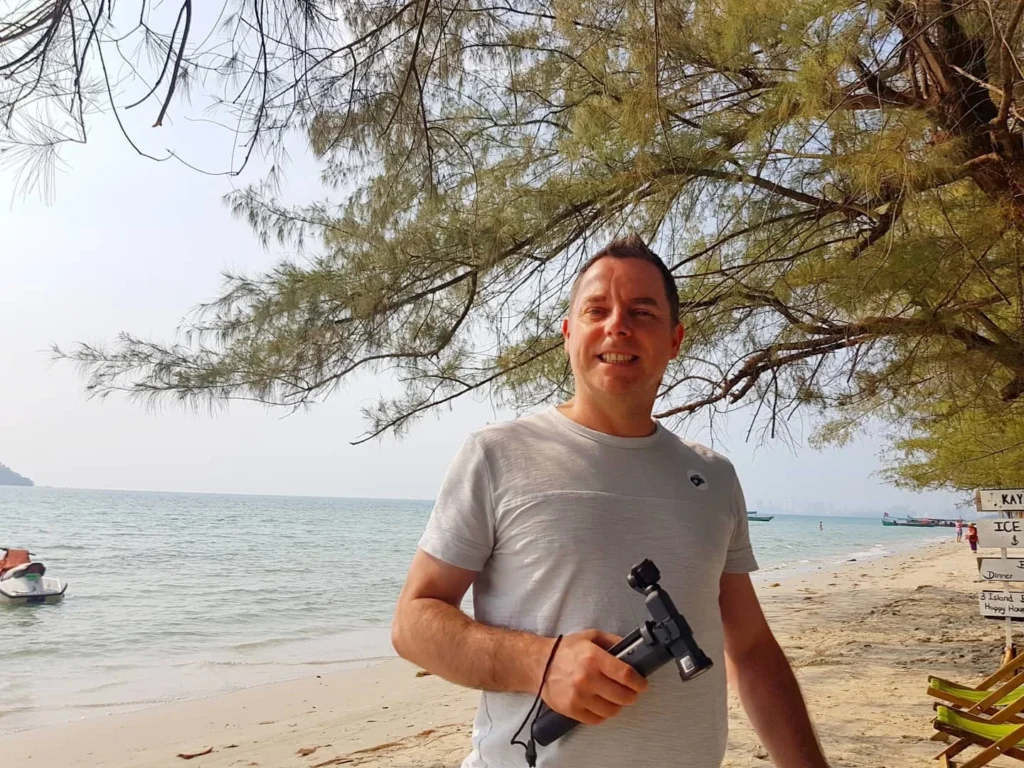 Cruising with Danny and Peter, Holland America Line, Westerdam, Sihanoukville, Cambodia | Pagoda visit in Sihanoukville during a cultural experience, featuring a monk blessing ceremony, vibrant local market tour, and serene beach retreat for a memorable spiritual and cultural day trip in Cambodia.